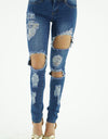 MEDIUM WASH SUPER RIPPED SKINNY JEANS