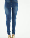 MEDIUM WASH SUPER RIPPED SKINNY JEANS